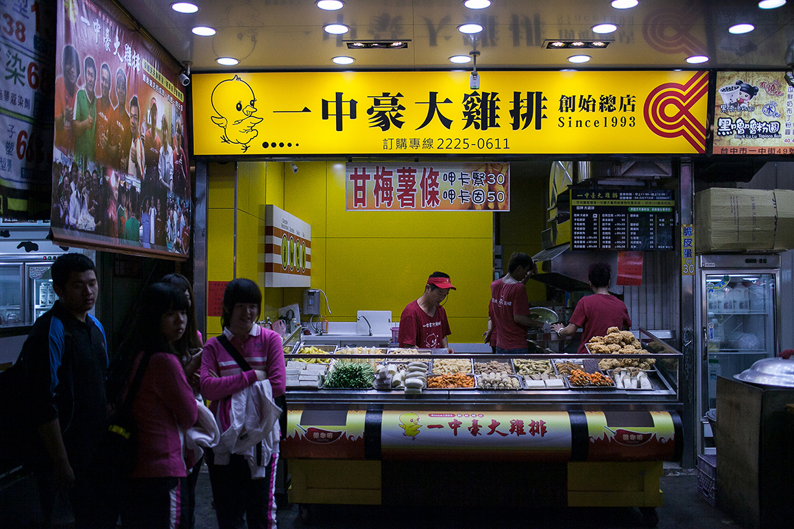 Stall selling large deep fried chicken steaks