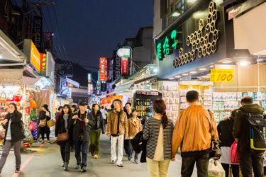 People walking through Shilin Night Market