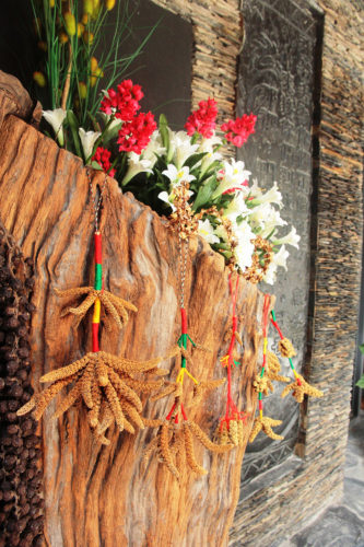 Hanging adornment made with millet