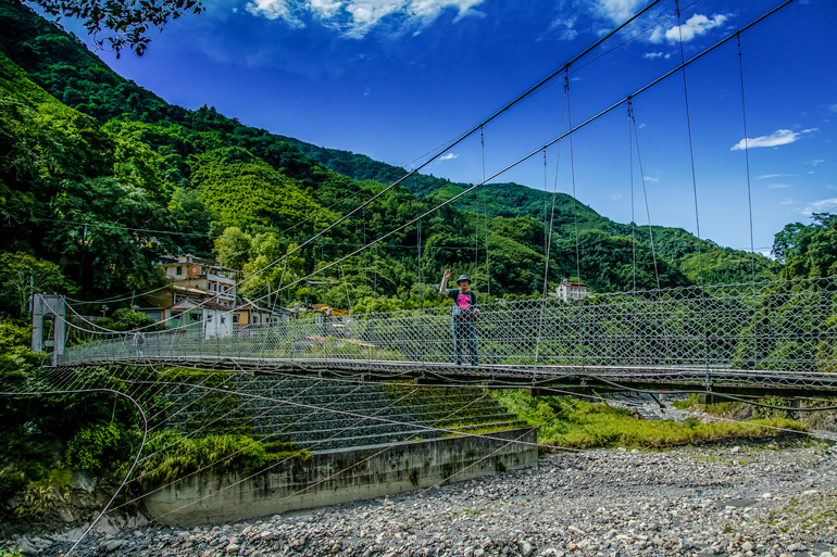 On a suspension bridge in Qingquan