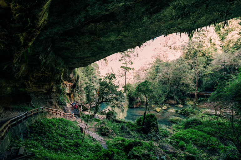 Cliff and lagoon at Songlon Rock Waterfall