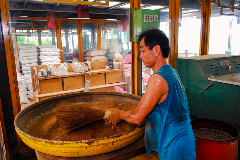 Worker at Singang Incense Artistic Culture Garden