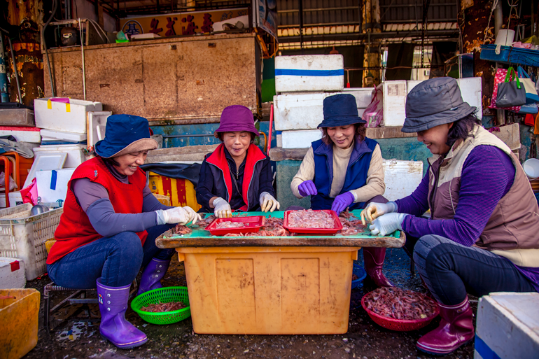 Shrimp ladies at fish market